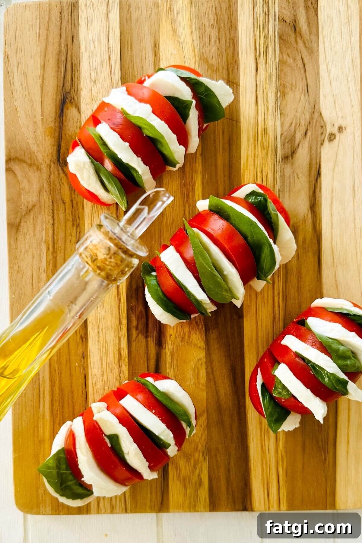 Stuffed Caprese Tomatoes with Mozzarella and Basil 6 olive oil and stuffed tomatoes with mozzarella and basil.
