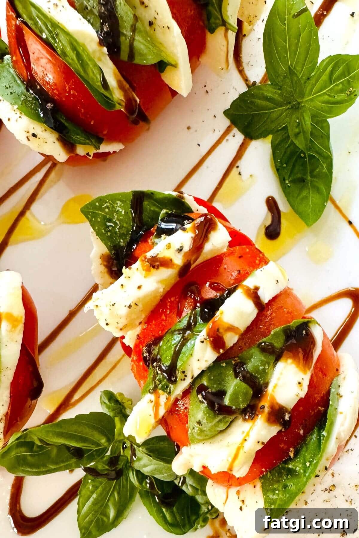 Stuffed Caprese Tomatoes with Mozzarella and Basil 9 a simple caprese tomato.