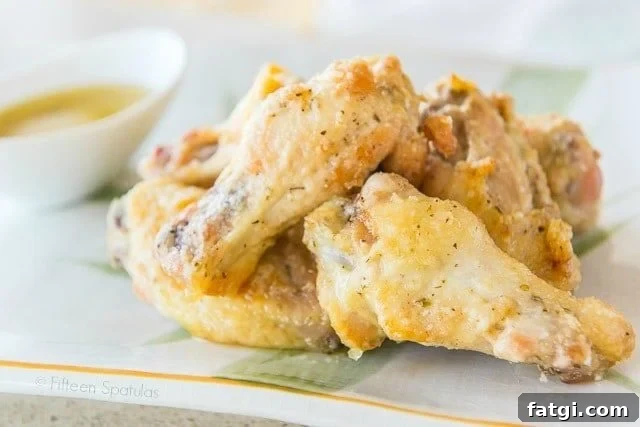 Crispy Garlic Parmesan Chicken Wings 4 Garlic Parmesan Wings Recipe - Served on Platter with Dipping Sauce in Bowl