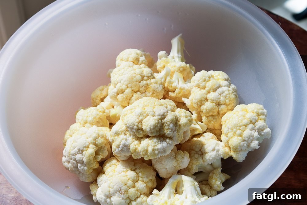 Roasted Zaatar Cauliflower with Golden Tahini Harissa Sauce 5 cauliflower in bowl