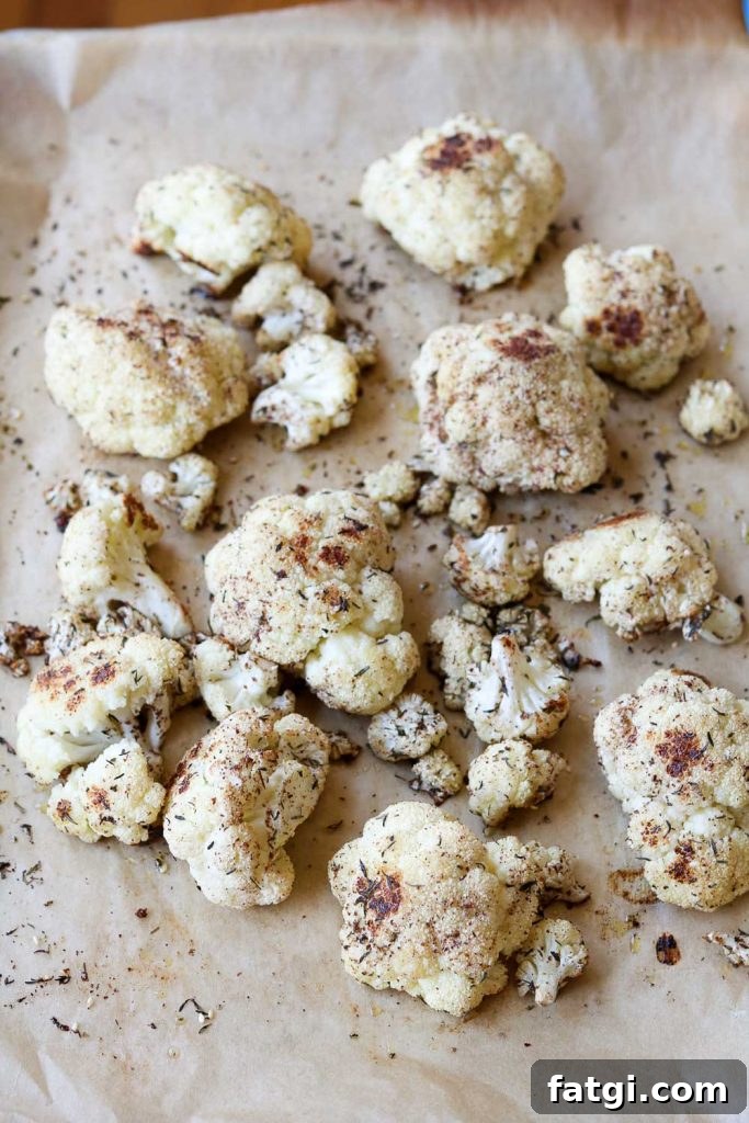 Roasted Zaatar Cauliflower with Golden Tahini Harissa Sauce 7 cauliflower on baking sheet