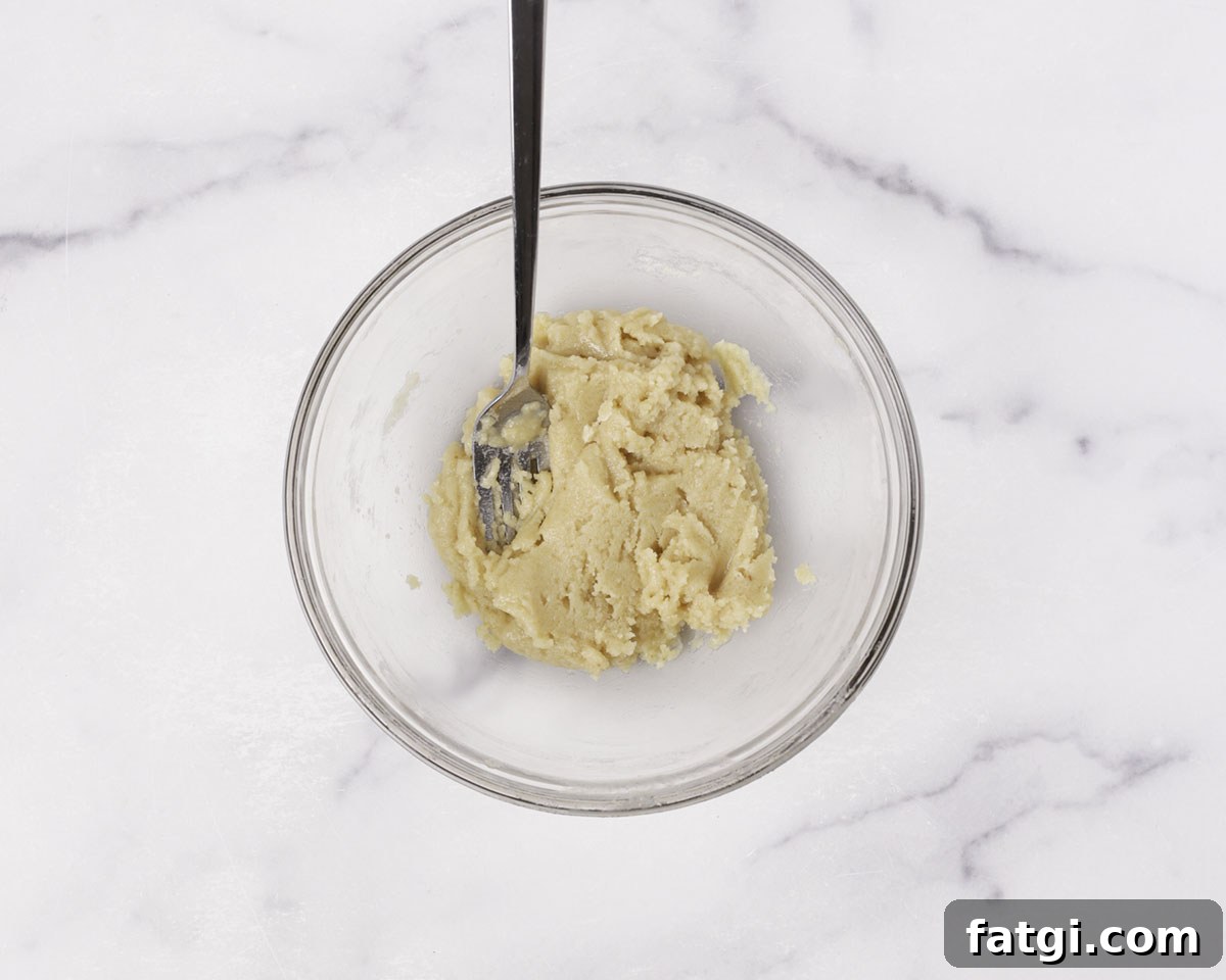 Mixing crumble topping for blueberry muffins
