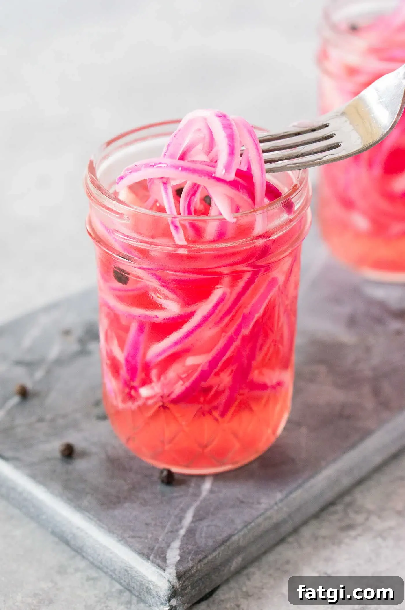 Pickled Red Onions Recipe for Tacos and Salads 2 pickled red onions in a jar