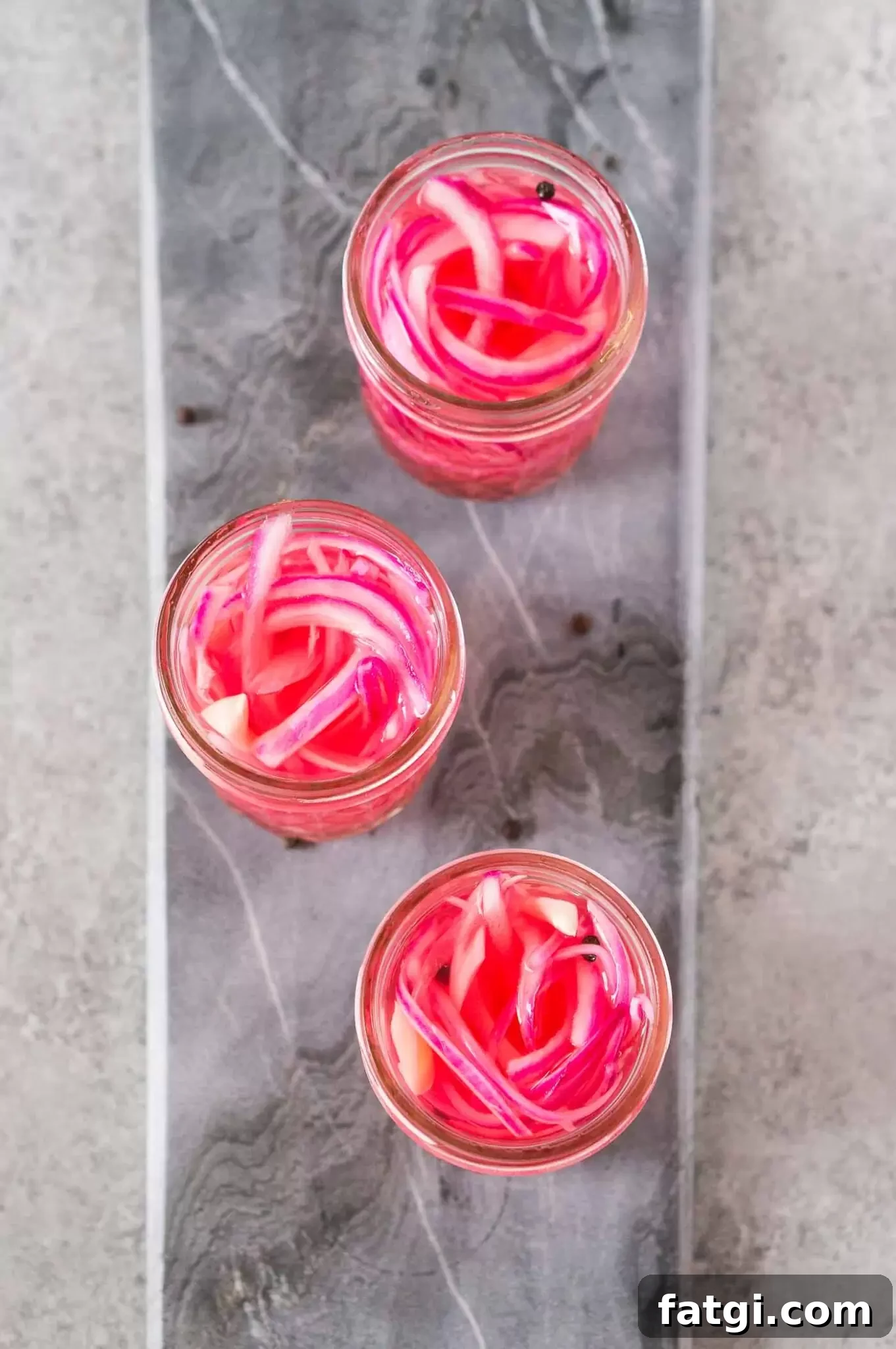 Pickled Red Onions Recipe for Tacos and Salads 7 pickled red onions on a gray board