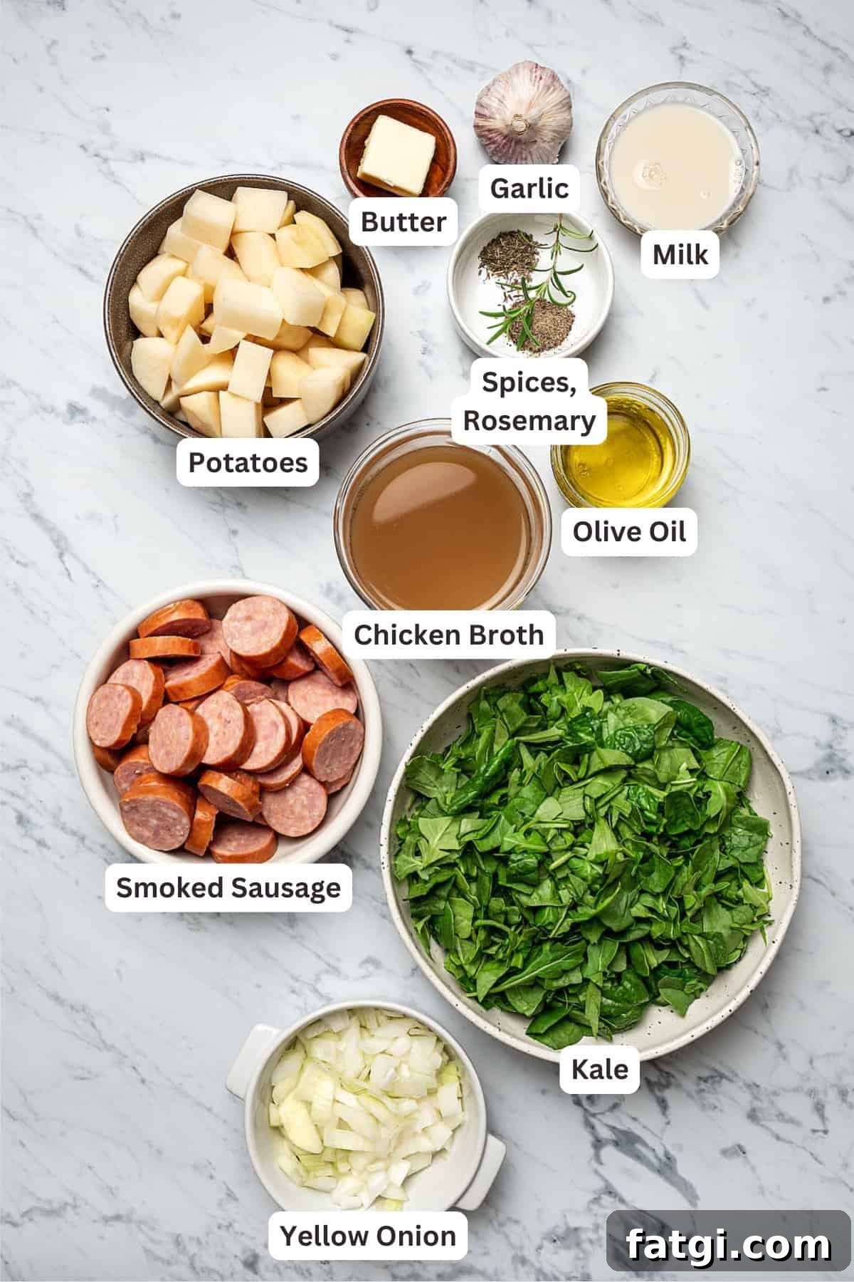 Ingredients for potato soup with smoked sausage and kale.