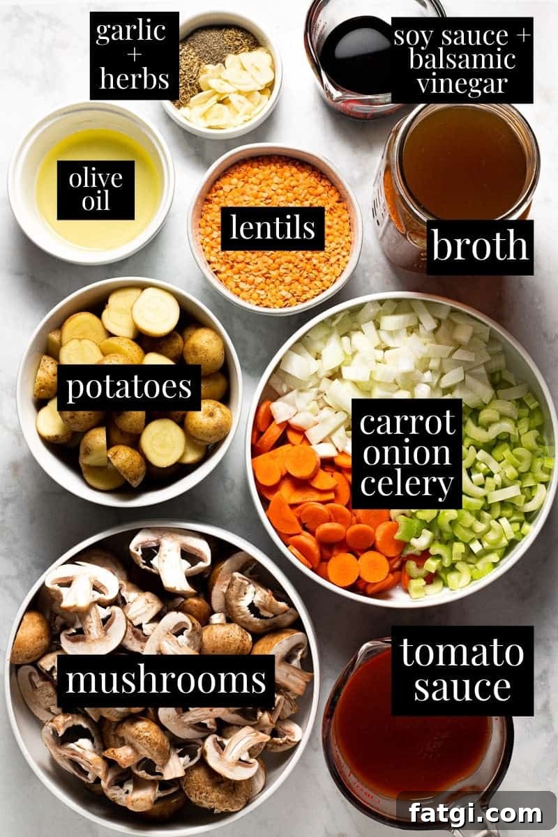 White marble counter top with bowls filled with ingredients to make this vegetable stew recipe