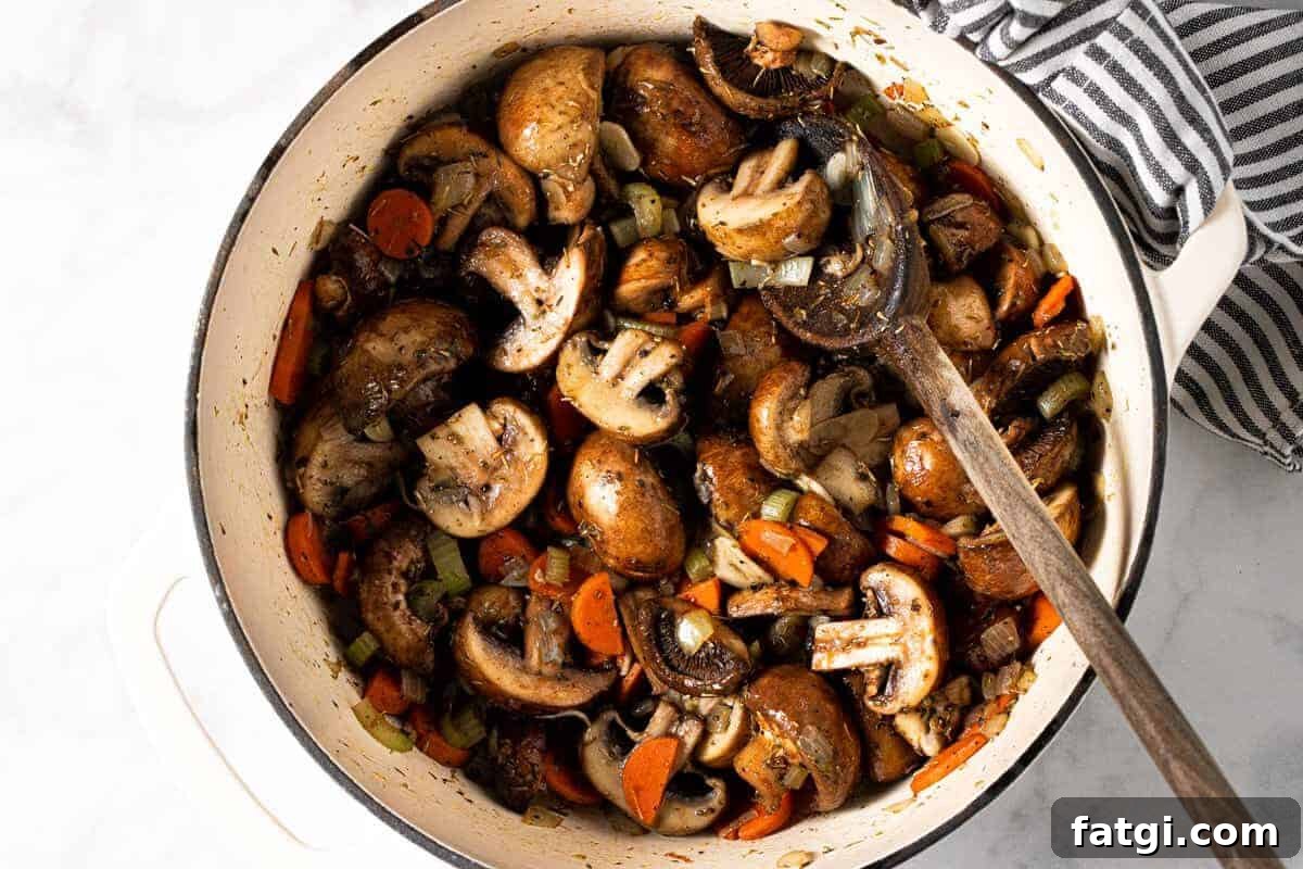 Large white pot filled with ingredients to make easy vegan stew