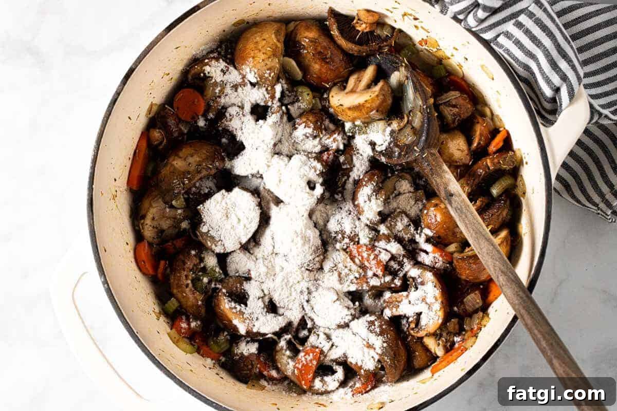 Large white pot filled with ingredients to make easy vegan stew