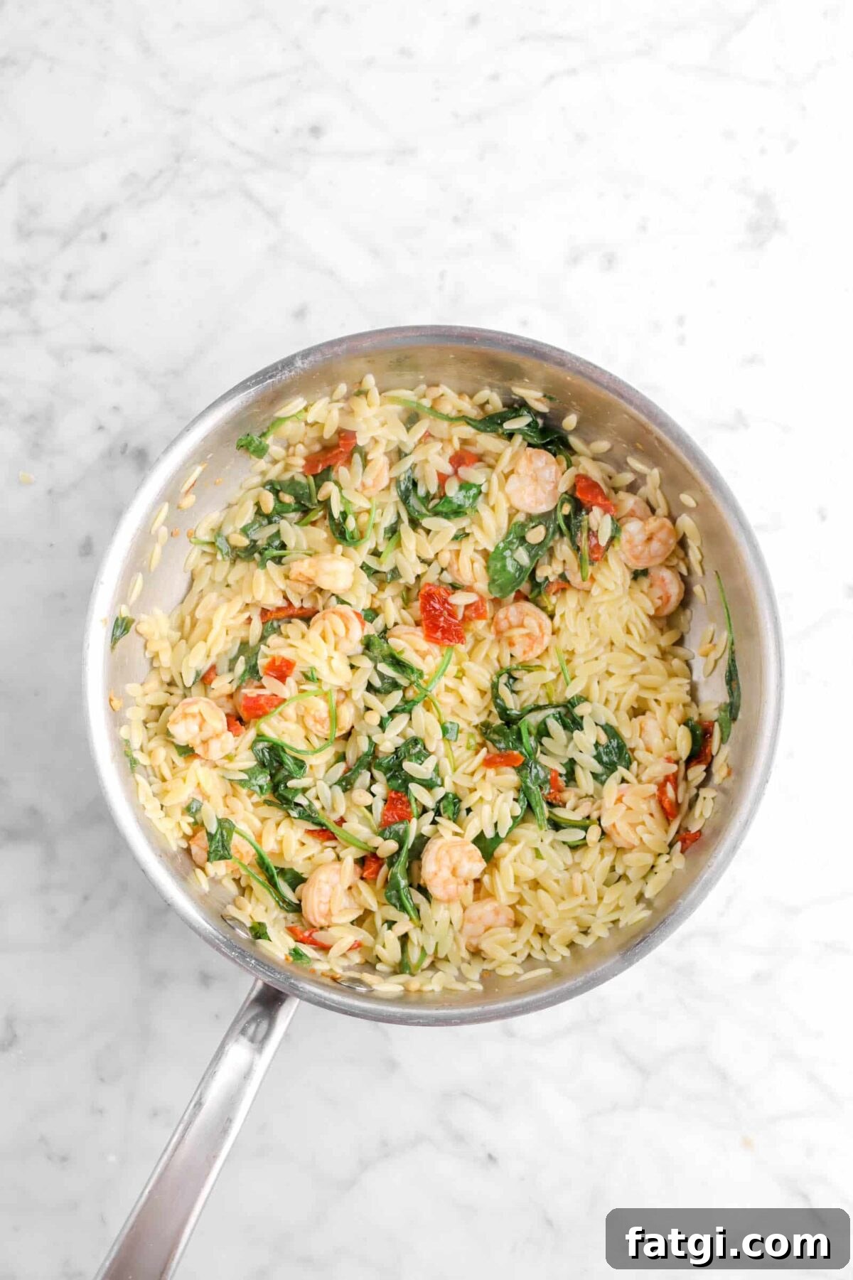 orzo stirred into mixture