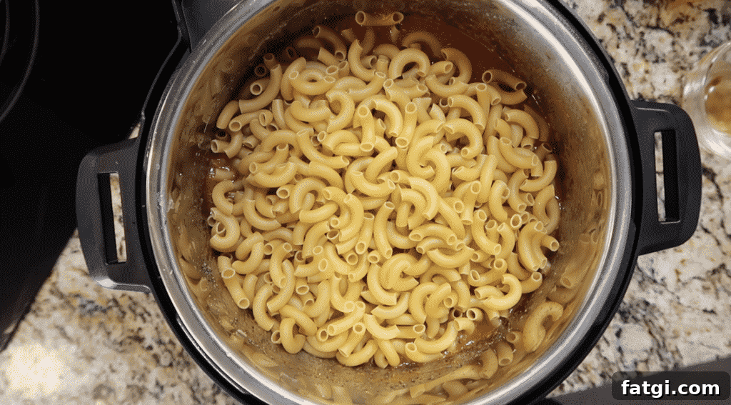 Adding pasta to the pot