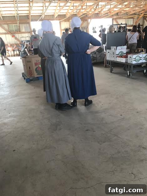 Buyers socializing at the Scioto Valley Produce Auction in Ohio