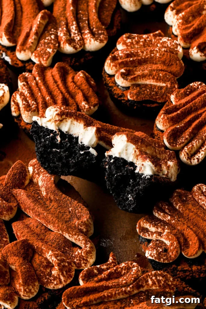 Baked Chocolate Tiramisu Donuts with Mascarpone Cream Recipe 2 chocolate tiramisu donuts with a bite taken out