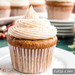Close up view of a gingerbread cupcake on a plate.