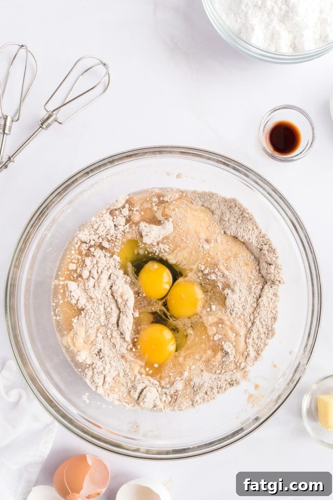 Cake mix, eggs, and oil in a bowl.