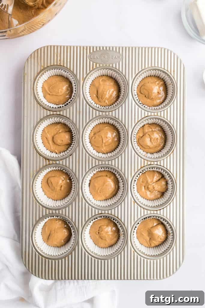 Cupcake batter in a pan.