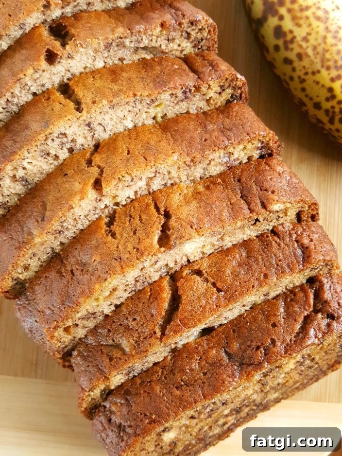 Banana Bread Recipe with 3 Bananas - Simple and easy recipe for moist banana bread made with 3 bananas and oil. Dairy-free, no mixer, one bowl, 8 minutes prep.