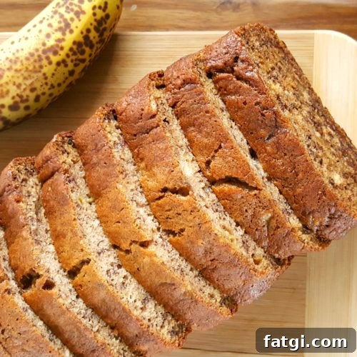 Banana Bread Recipe with 3 Bananas - Simple and easy recipe for moist banana bread made with 3 bananas and oil. Dairy-free, no mixer, one bowl, 8 minutes prep.
