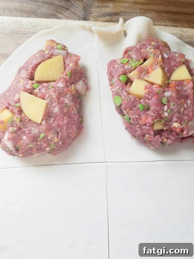 meat mixture on pie dough