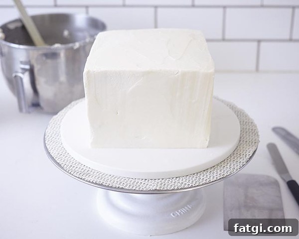 Square cake frosted with buttercream