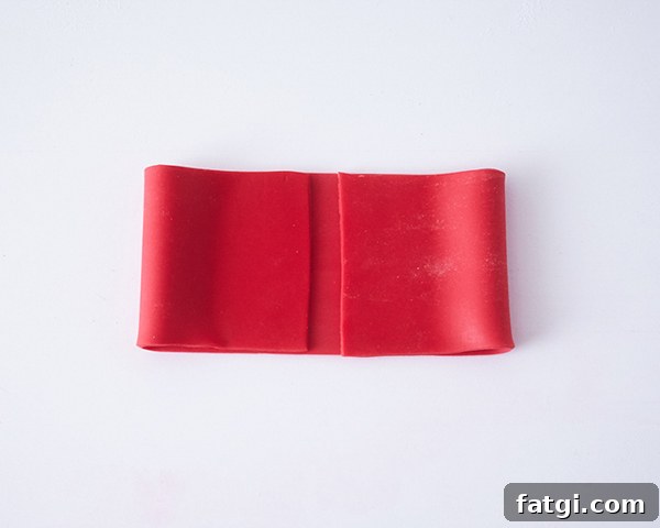 Red fondant folded into bow loops