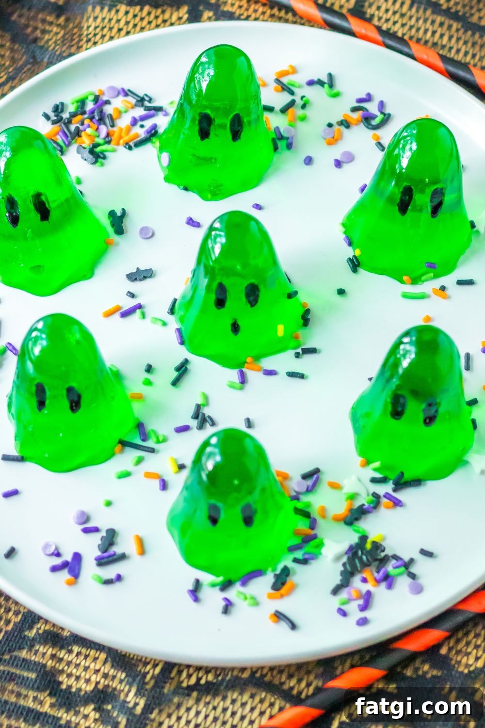 Ghost Jello Shots for Halloween Parties 12 plate with jello shots on it