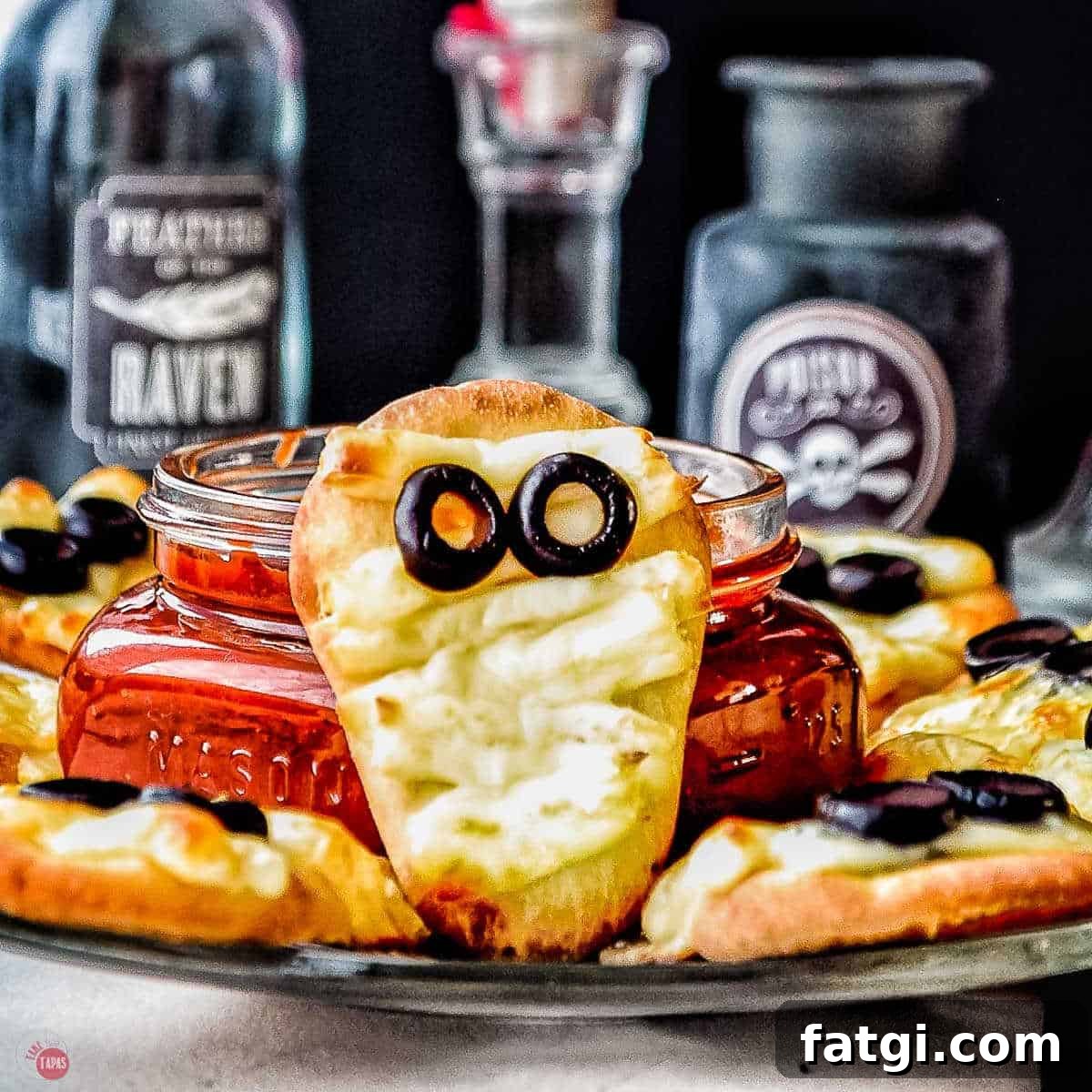 Mini Mummy Pizza Dippers for Halloween 13 mummy flatbread with bloody candles