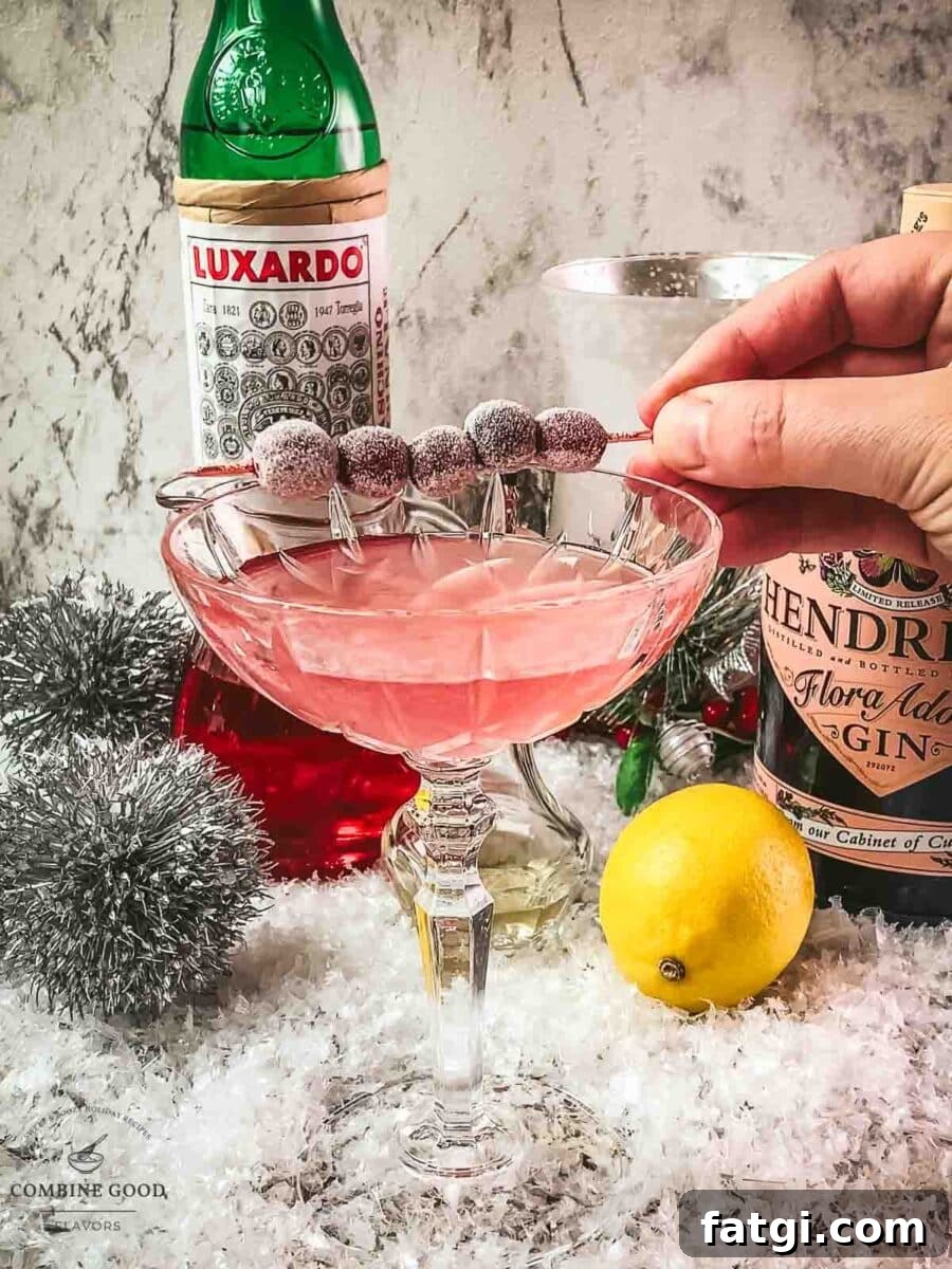 Cranberry Maraschino Sour Cocktail Recipe 11 Place the frosted cranberries with the cocktail skewer on top of the glass.