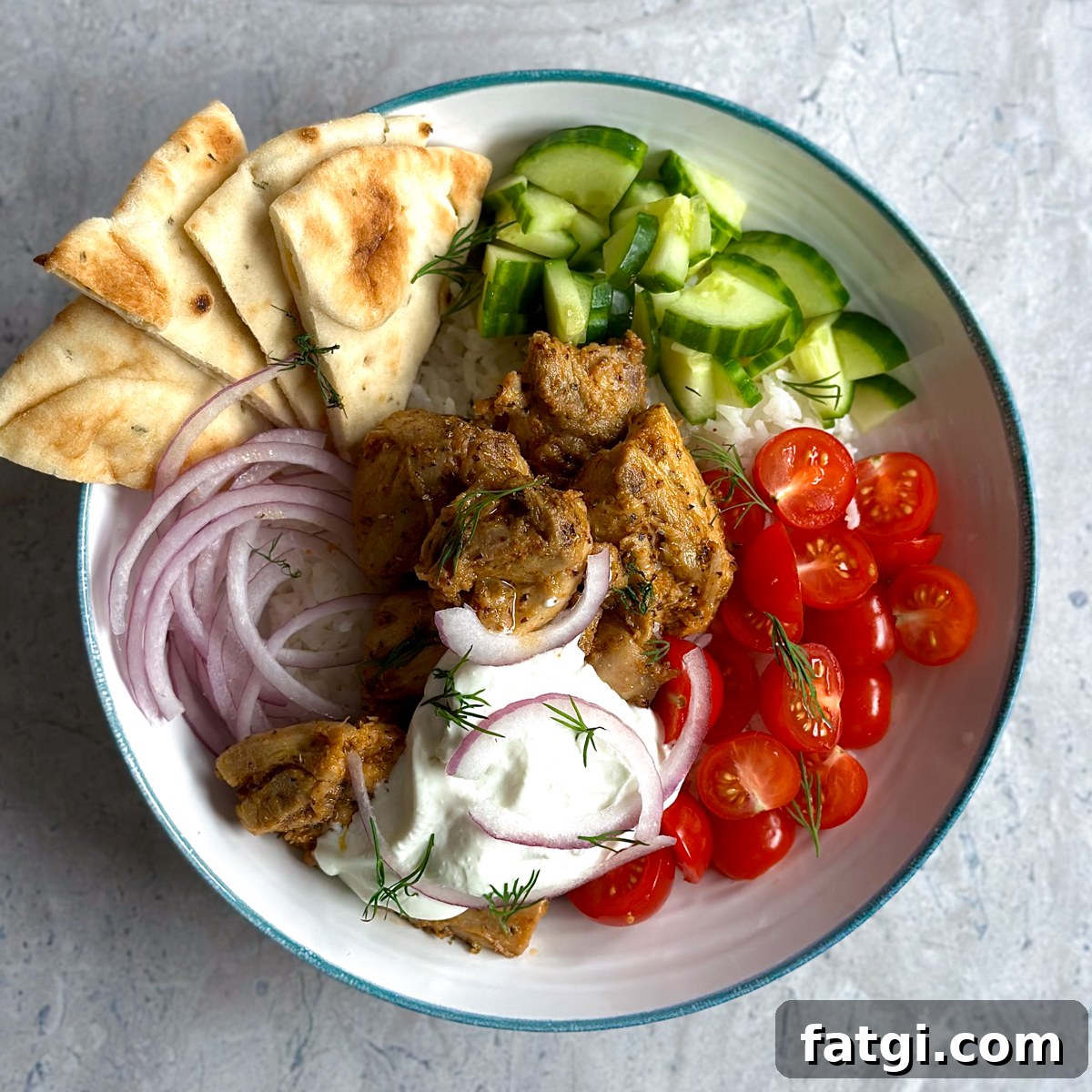 Greek Chicken Rice Bowl Recipe with Lemon, Herbs and Feta 8 Easy Greek Chicken Bowl Recipe (with rice)