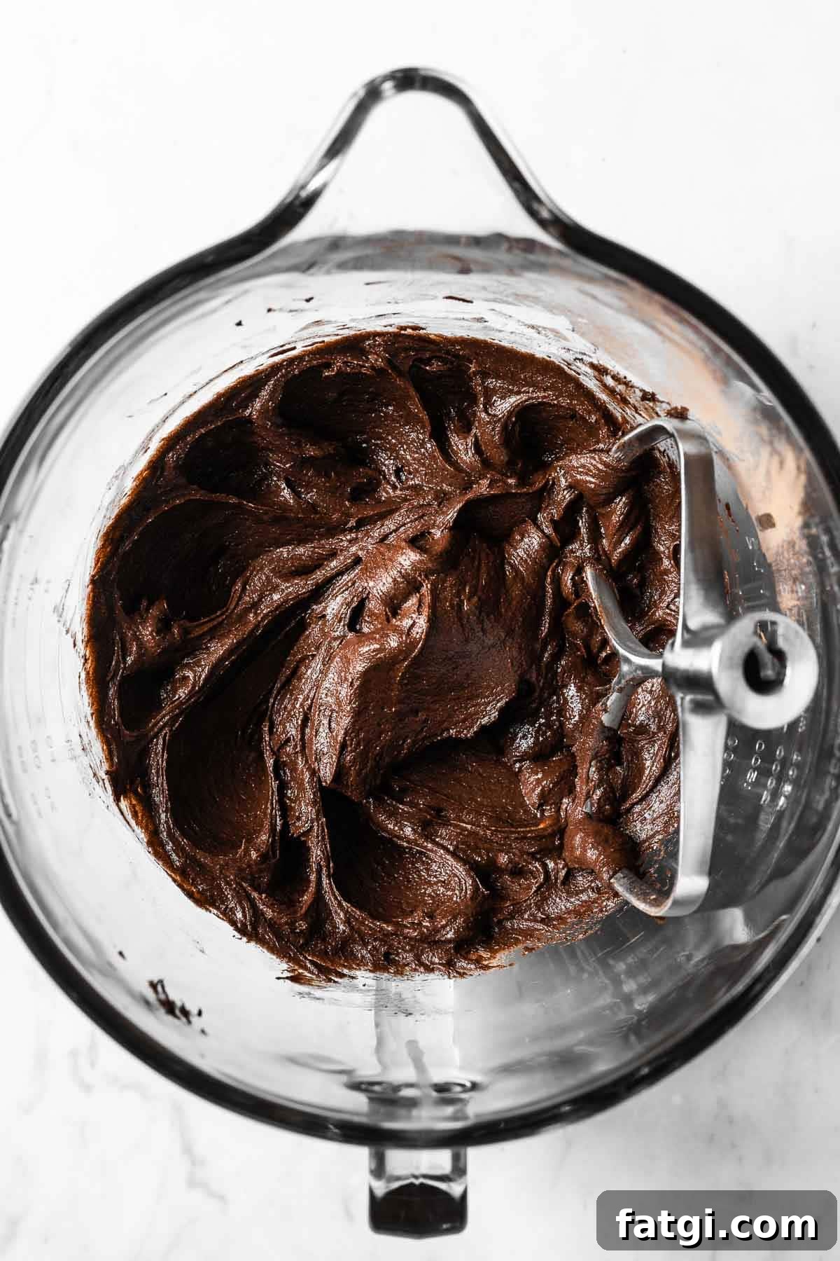 Mascarpone stirred into the wet ingredients for chocolate cookie dough.