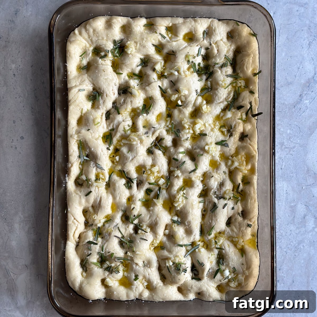 dimpled focaccia ready to bake