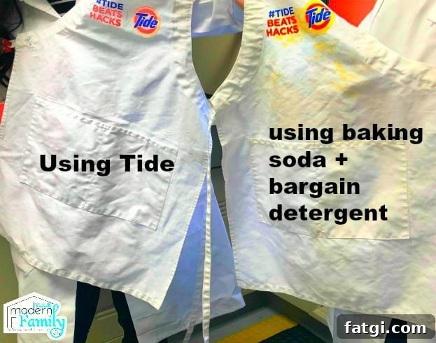 Two white aprons side by side, one with no stains and the other with food stains still on it.