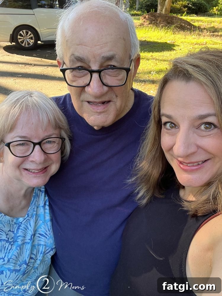 Anne from Simply2Moms taking a selfie with her parents.