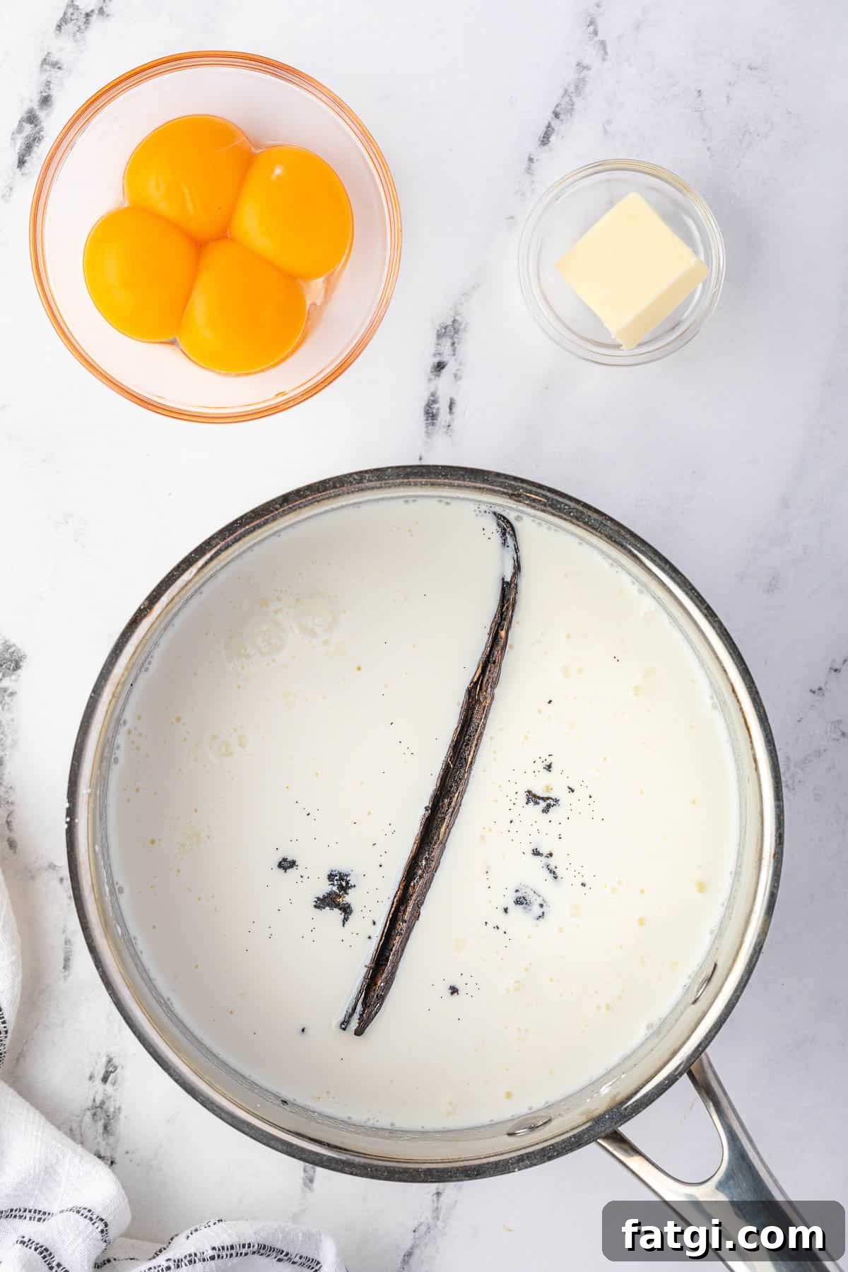 scraped vanilla bean in pan for pudding