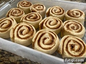 Rolled cinnamon log cut into slices
