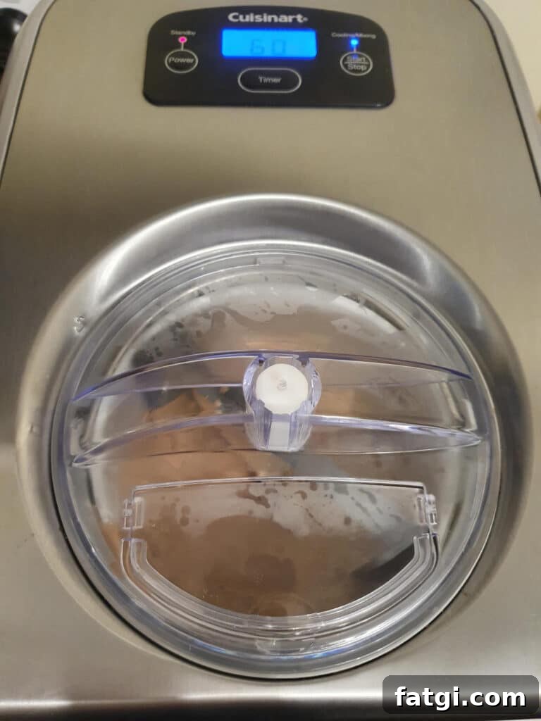 churning ice cream in ice cream churner.