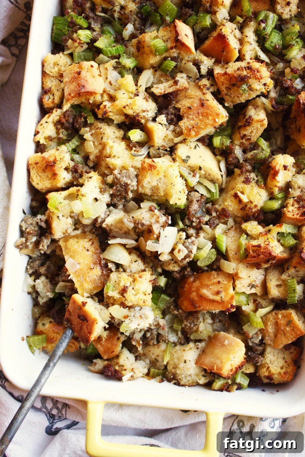 Ciabatta and Pork Sausage Stuffing - rustic Thanksgiving stuffing made with ciabatta, sourdough, pork sausage, celery, onions, herbs, and chicken stock
