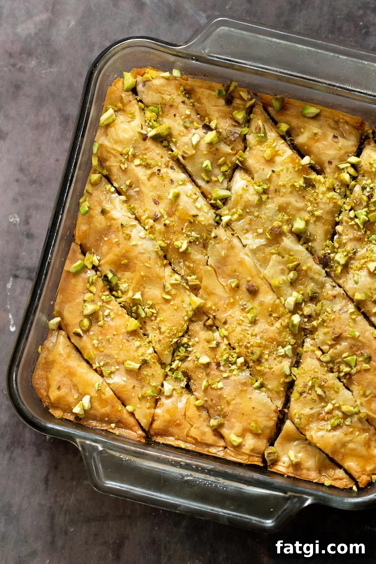 Vegan Baklava with Date and Nut Filling 2 vegan baklava in a pyrex dish