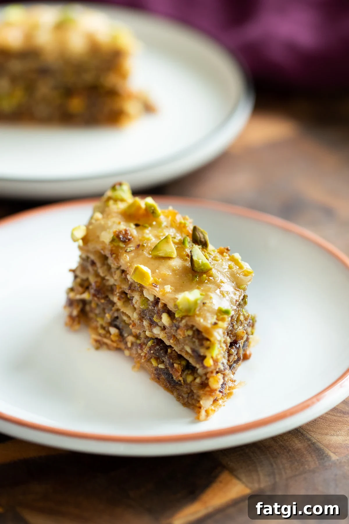 Vegan Baklava with Date and Nut Filling 20 close-up of a bite sized piece of vegan homemade baklava
