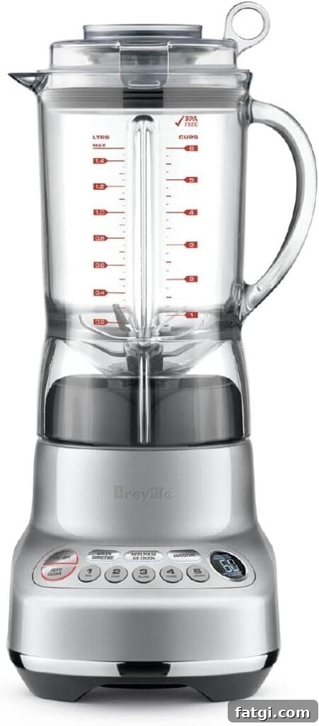 A blender with a silver bottom and the word Breville on it. 