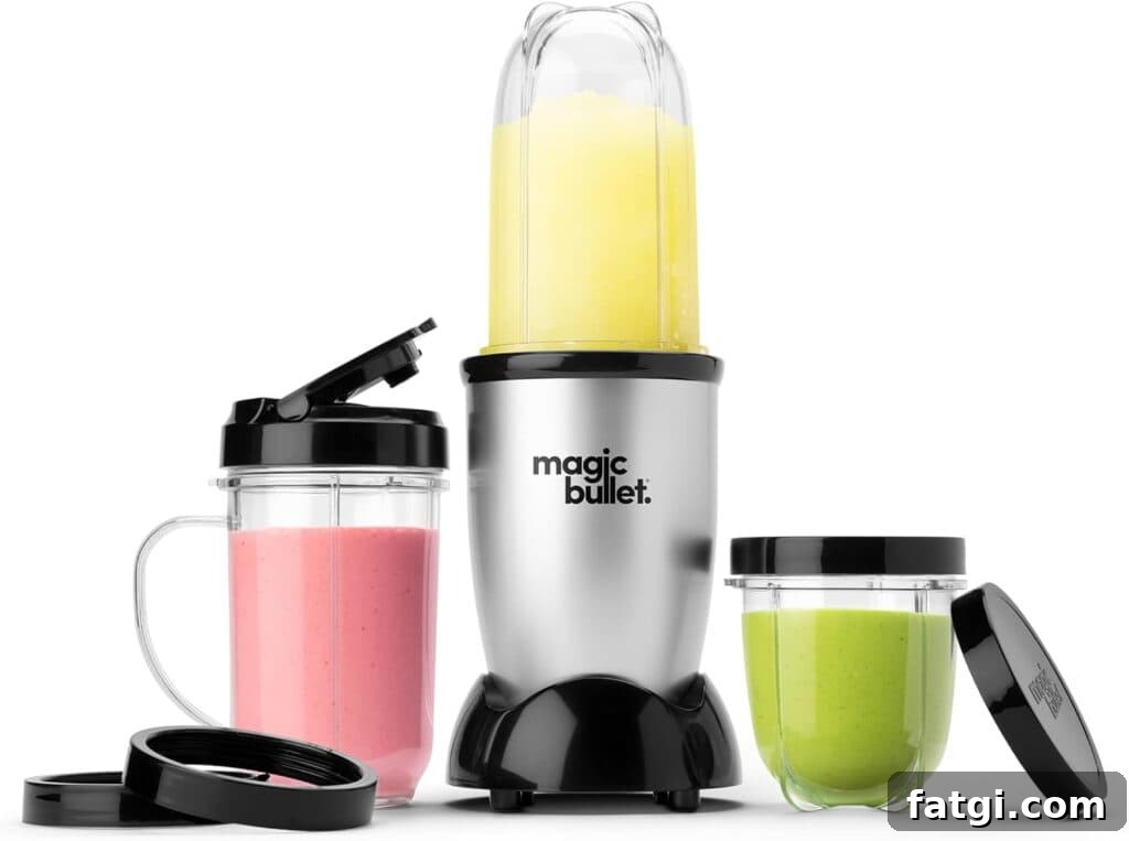 A blender with the words magic bullet on ti and two jars. 