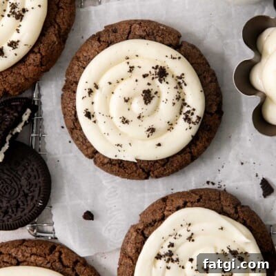gluten-free Oreo Crumbl cookies on a wire rack with parchment paper