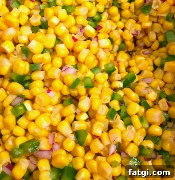 Frito Corn Salad with Cheddar and Chili Cheese Chips 5 corn added to onion and green pepper