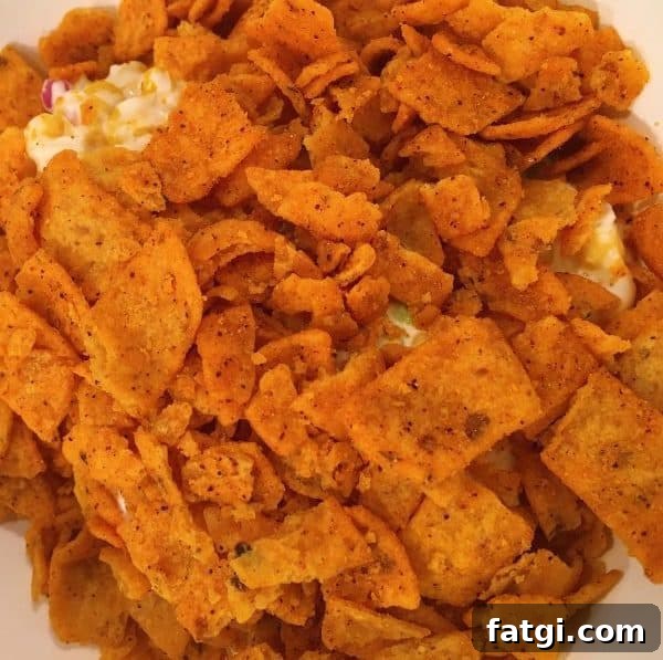 Frito Corn Salad with Cheddar and Chili Cheese Chips 7 crushed chili cheese fritos