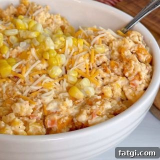 Frito Corn Salad with Cheddar and Chili Cheese Chips 10 Frito Corn Salad in a white bowl up close.