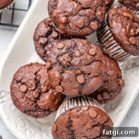 top view of chocolate muffins on a white platter