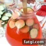 cucumber watermelon punch being stirred