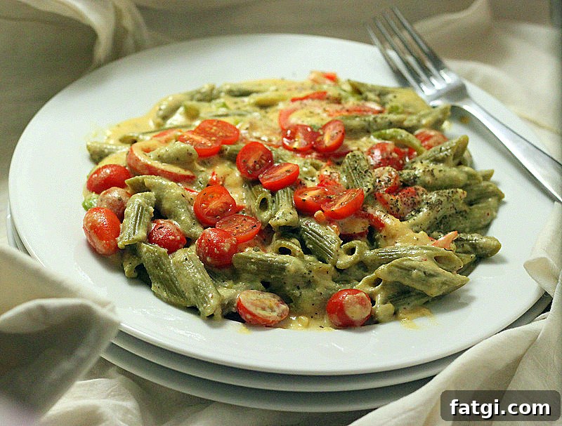 Vegan Chipotle Habanero Spinach Penne with Cashew Cream 7 Spinach penne pasta with cherry tomatoes and creamy sauce