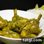 A close up of curry chicken drumsticks.