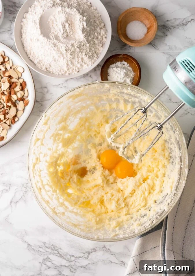 cream butter with sugar in bowl add egg yolks