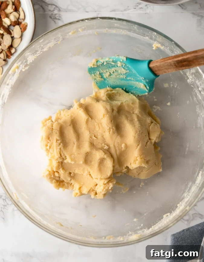 cookie dough in bowl with spatula